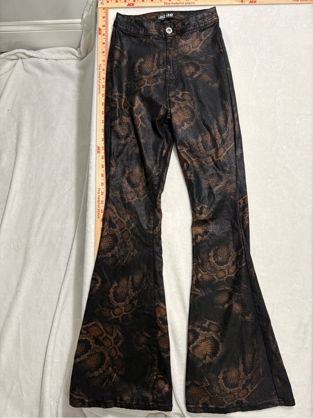 JcJo Womenβs Black/Brown Snake-Print Flared Jeans